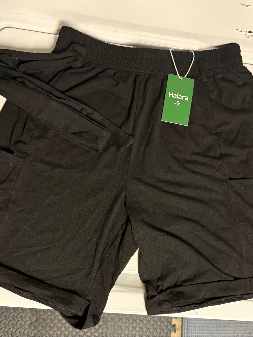 HALARA Black Athletic Women’s Shorts with Utility Pockets with a tie on the side